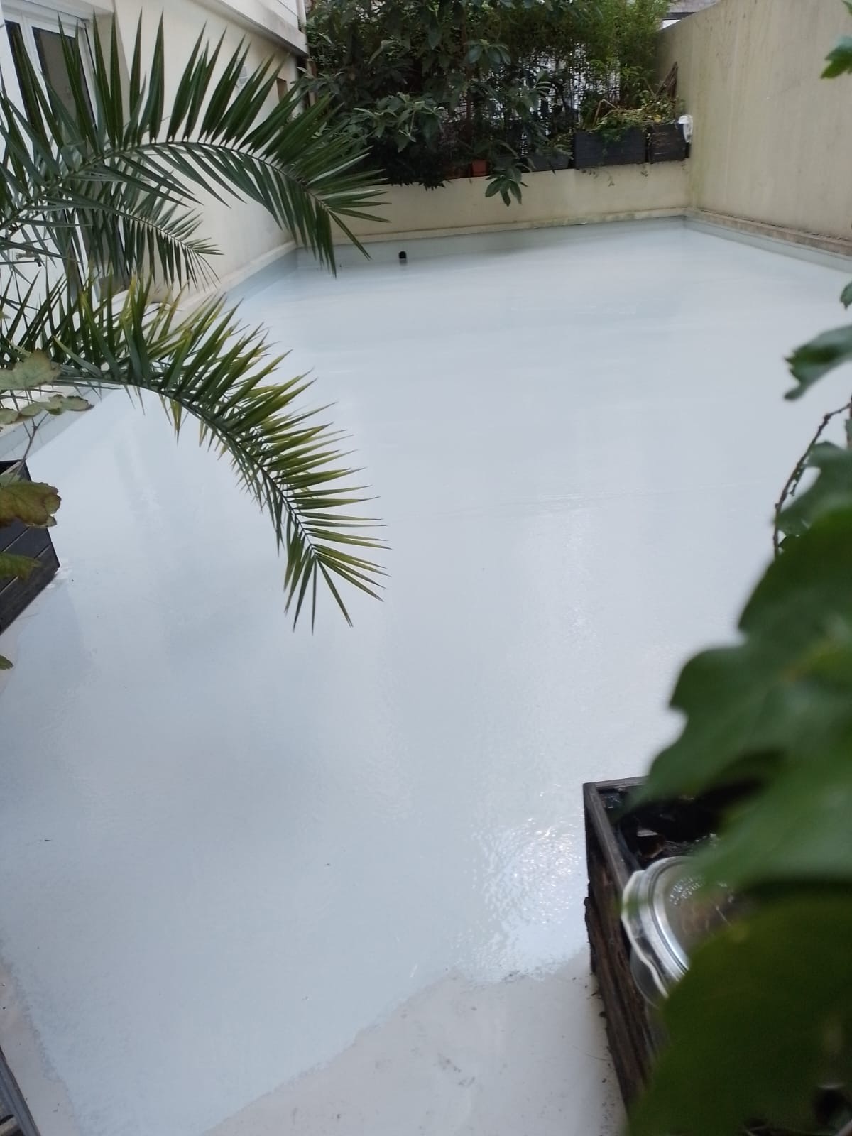 Réfection terrasse carrelage Paris 12e – étanchéité liquide Application de l'étanchéité liquide sur le sol d'une terrasse à Paris 12e, BATI DIAS